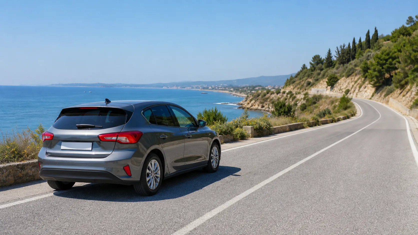 Rental car on a coastal road near Durres on the Albanian Adriatic coast