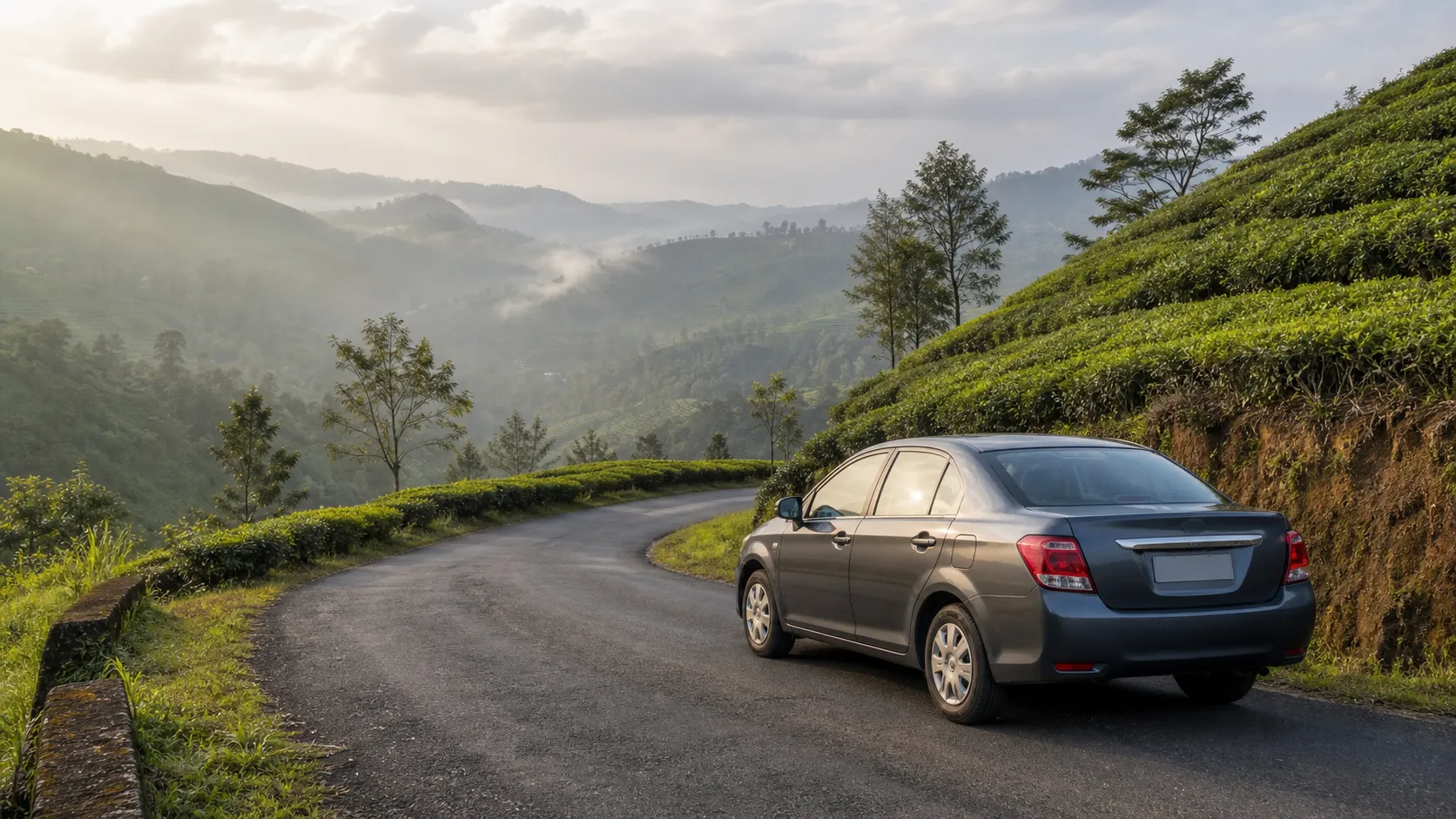 Rental car on a winding tea-country road near Kandy, Sri Lanka