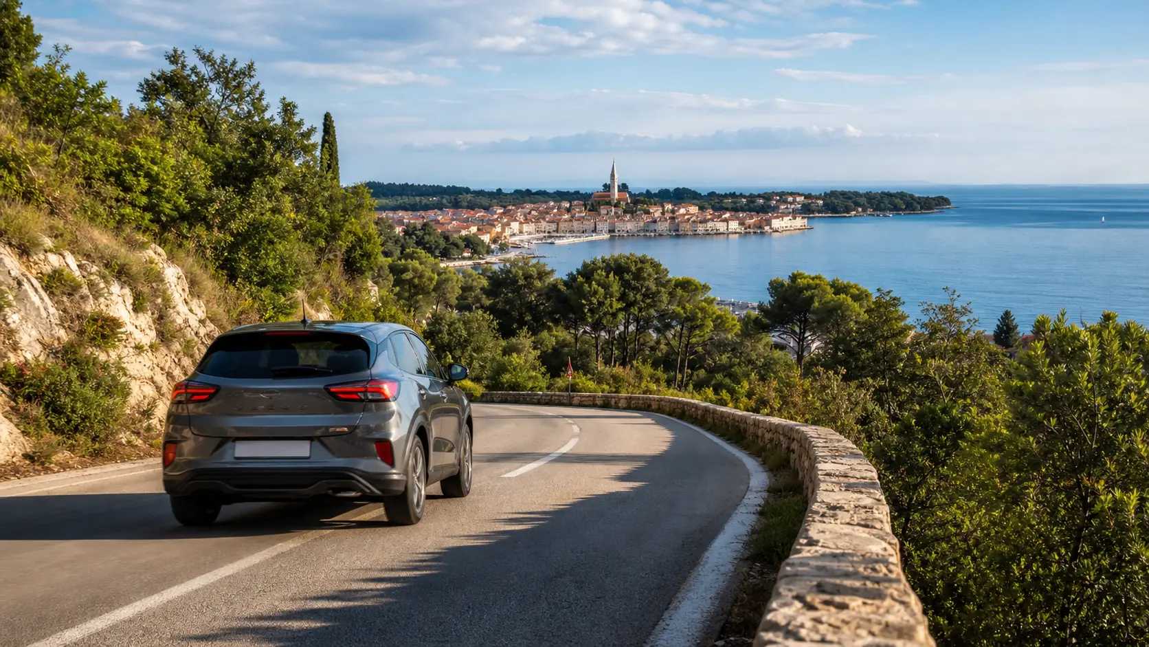 Rental car on a coastal road near Rovinj in Istria, Croatia